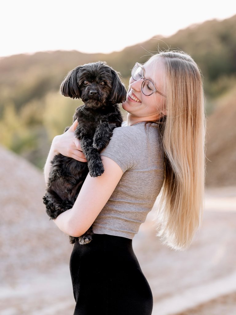 Hund auf dem Arm